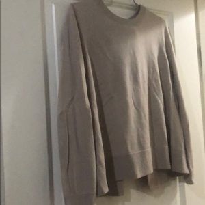 Beige sweater w 3 bows in the back